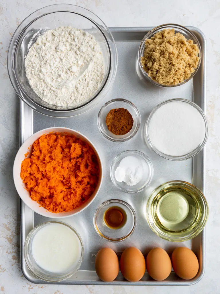 image of ingredients that have been laid out to make a 6-inch carrot cake.