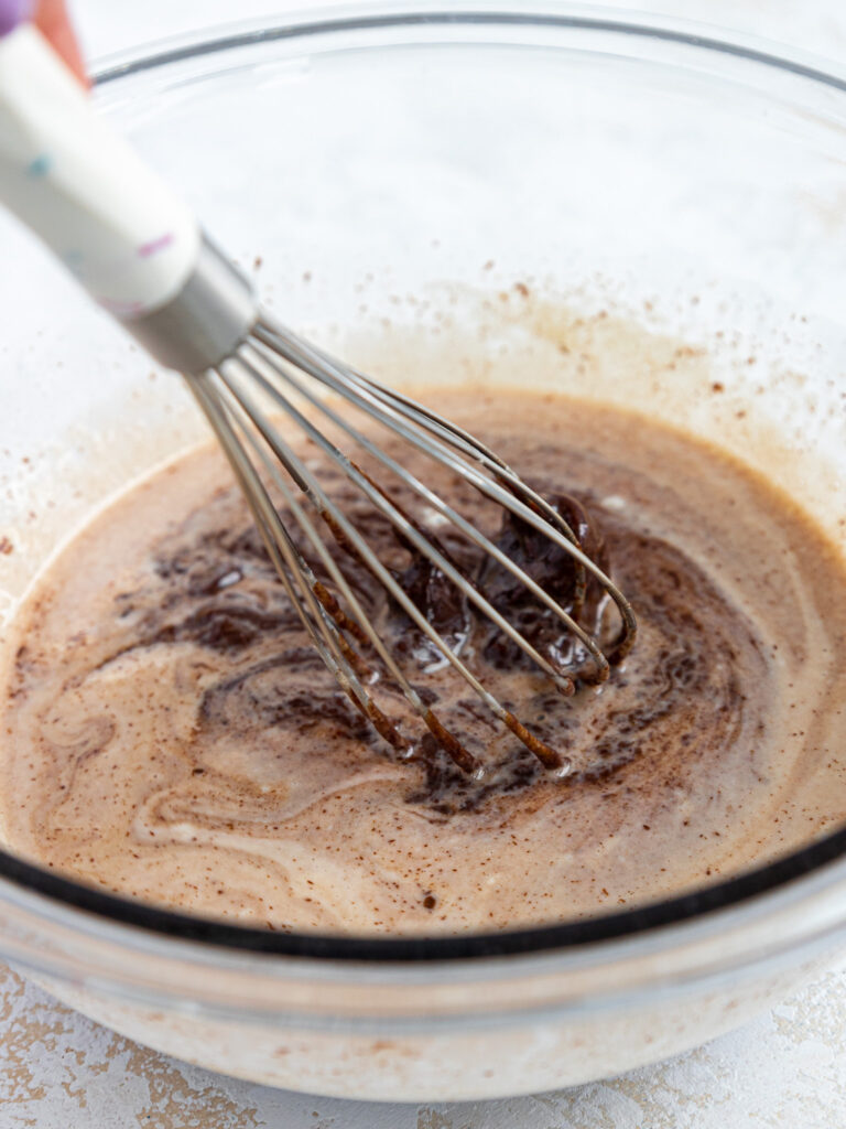 image of spreadable dark chocolate ganache being mixed together