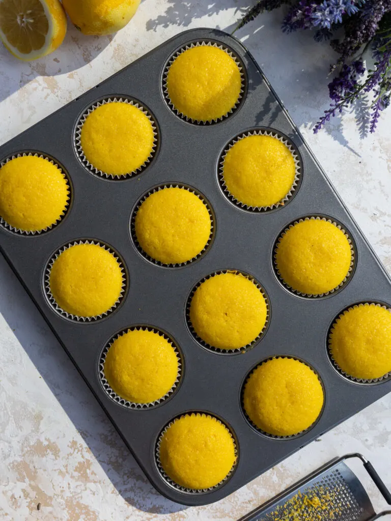 image of baked lemon cupcakes that are cooling in the pan