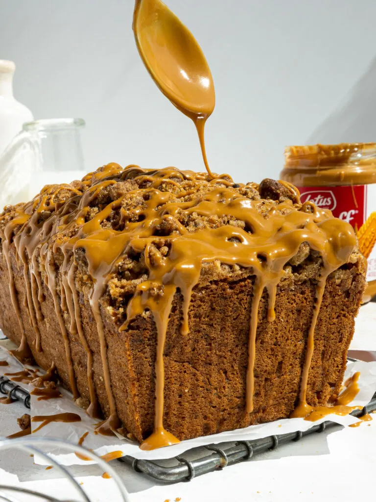 image of biscoff banana bread being drizzled with warm cookie butter