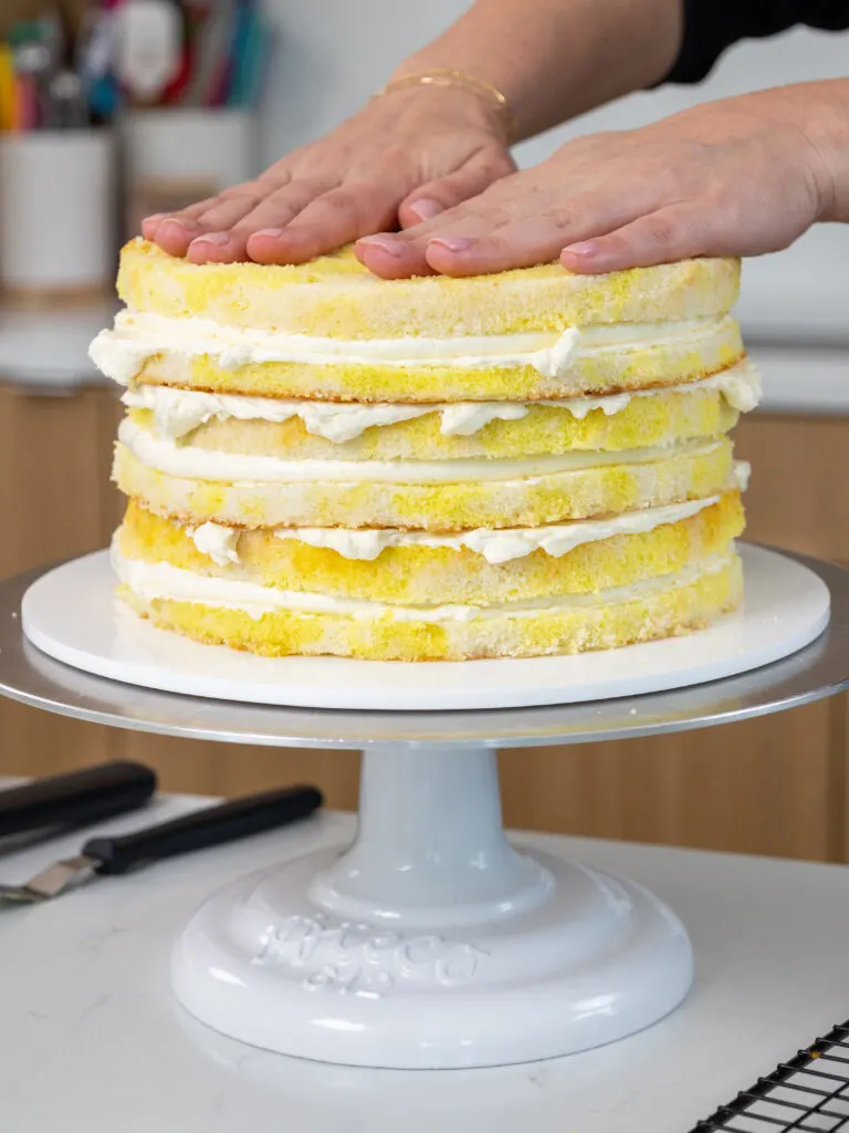 image of a lemon curd cake that's been stacked and filled