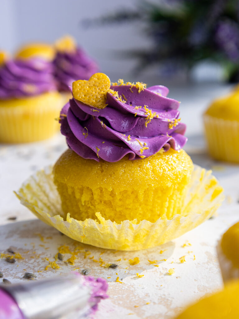 image of lemon lavender cupcakes that have been unwrapped from the liner