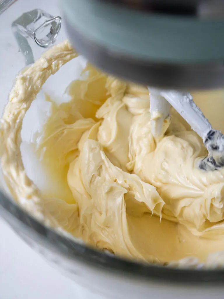 image of butter being beat until smooth in a stand mixer