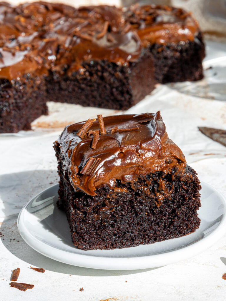 image of a chocolate snack cake that's been cut into to show how tender and moist it is