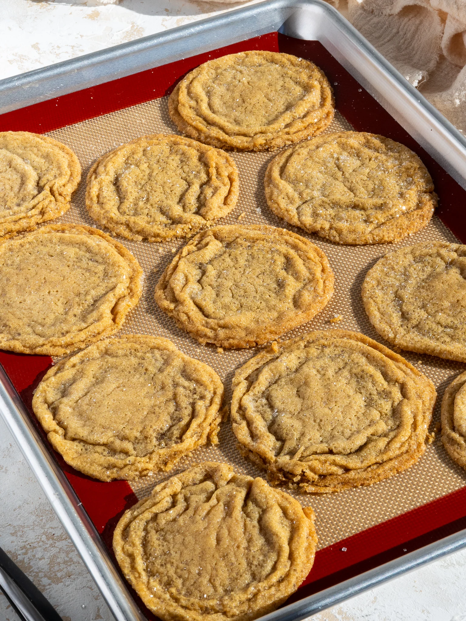 image of brown butter sugar cookies cooling on a baking sheet