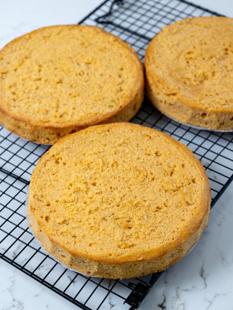 image of baked pumpkin cake layers that have been leveled and are ready to be frosted