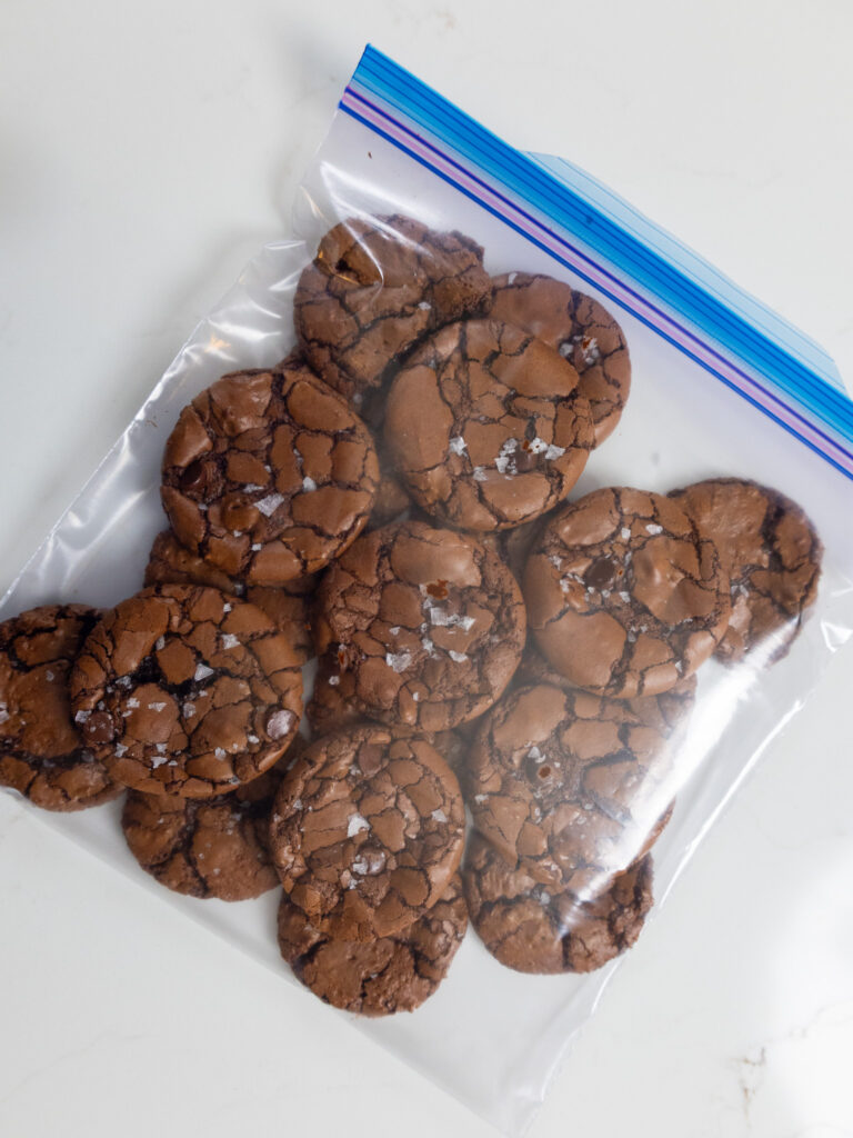 image of brownie crinkle cookies stored in a ziplock bag