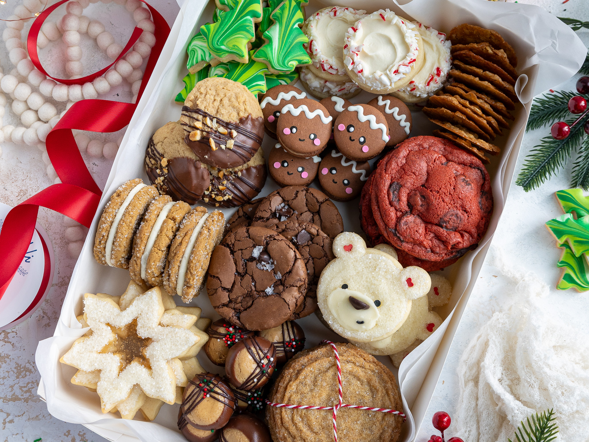 image of an adorable Christmas cookie box made with 12 different cookie recipes