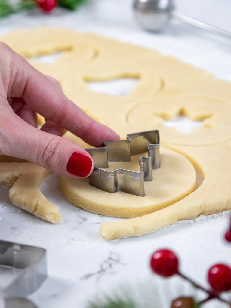 image of cutting out cookie dough to make stained glass cookies