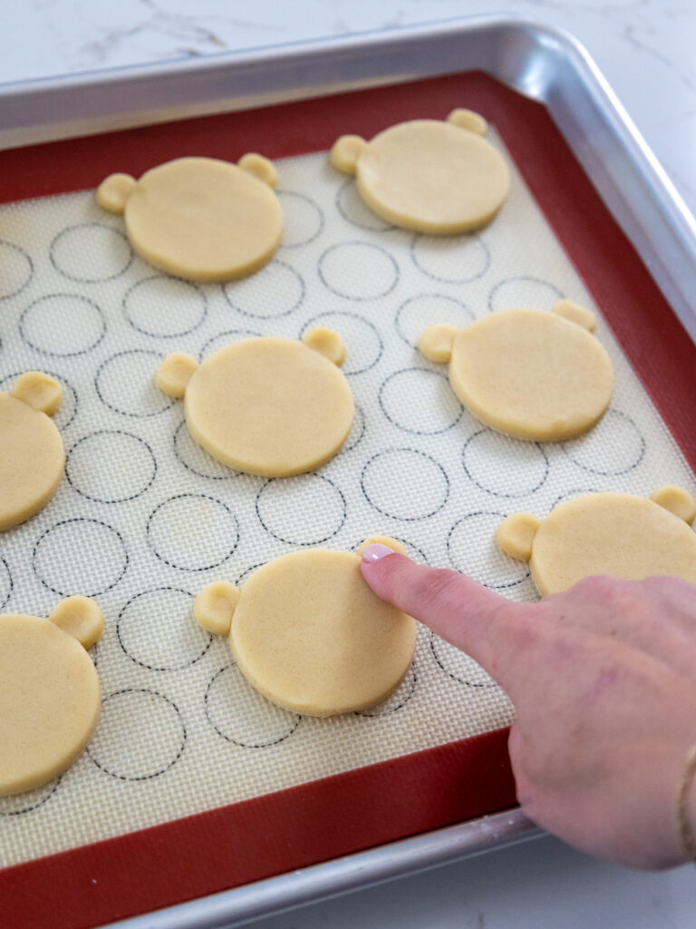 image of polar bear cookies being shaped before being baked