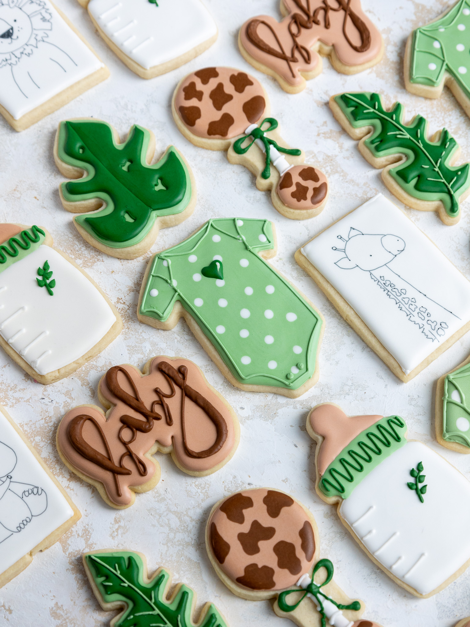 image of jungle themed sugar cookies that have been made for a baby shower