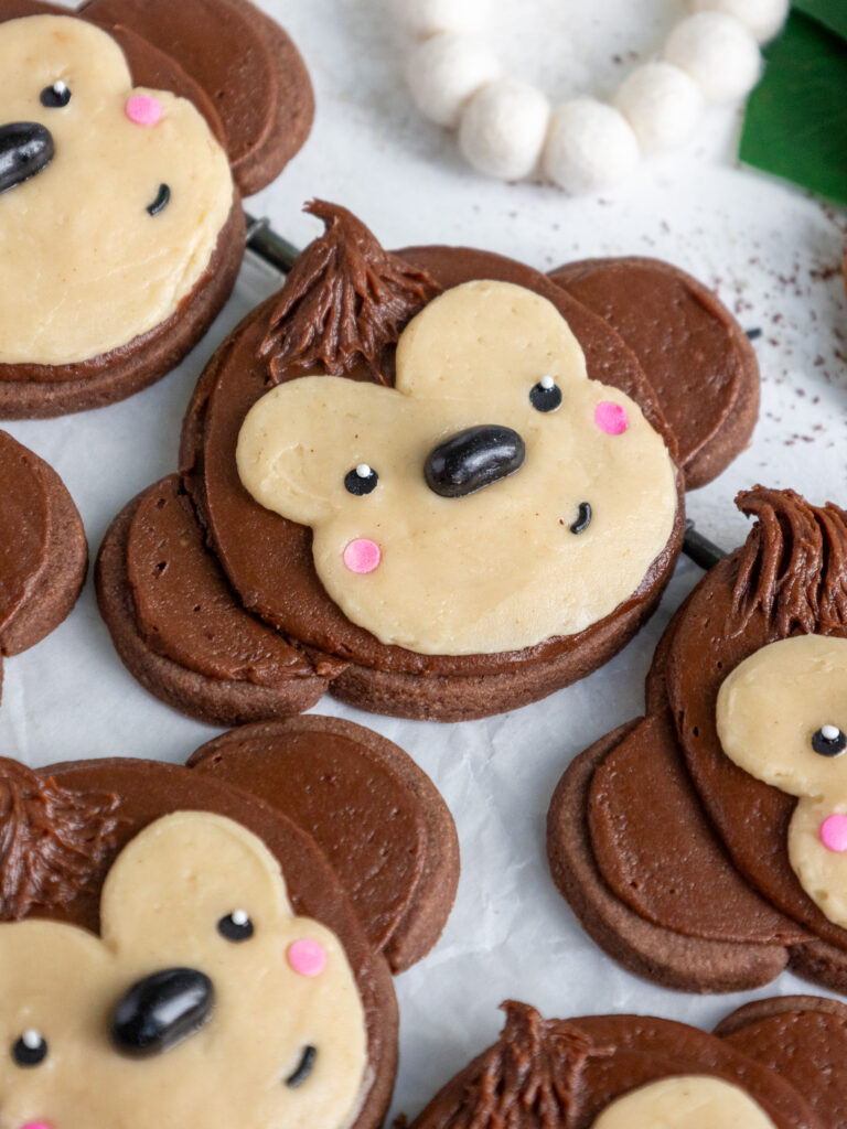 image of a cute monkey cookie decorated with buttercream frosting