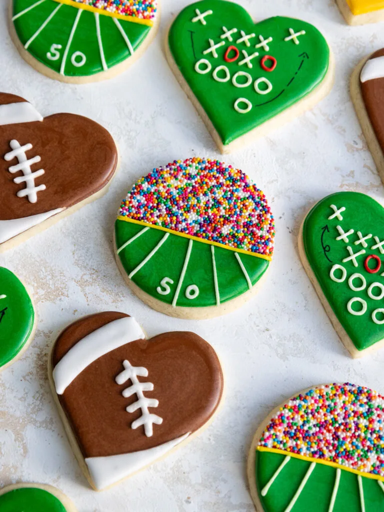 image of cute football sugar cookies with cookie that looks like a football field