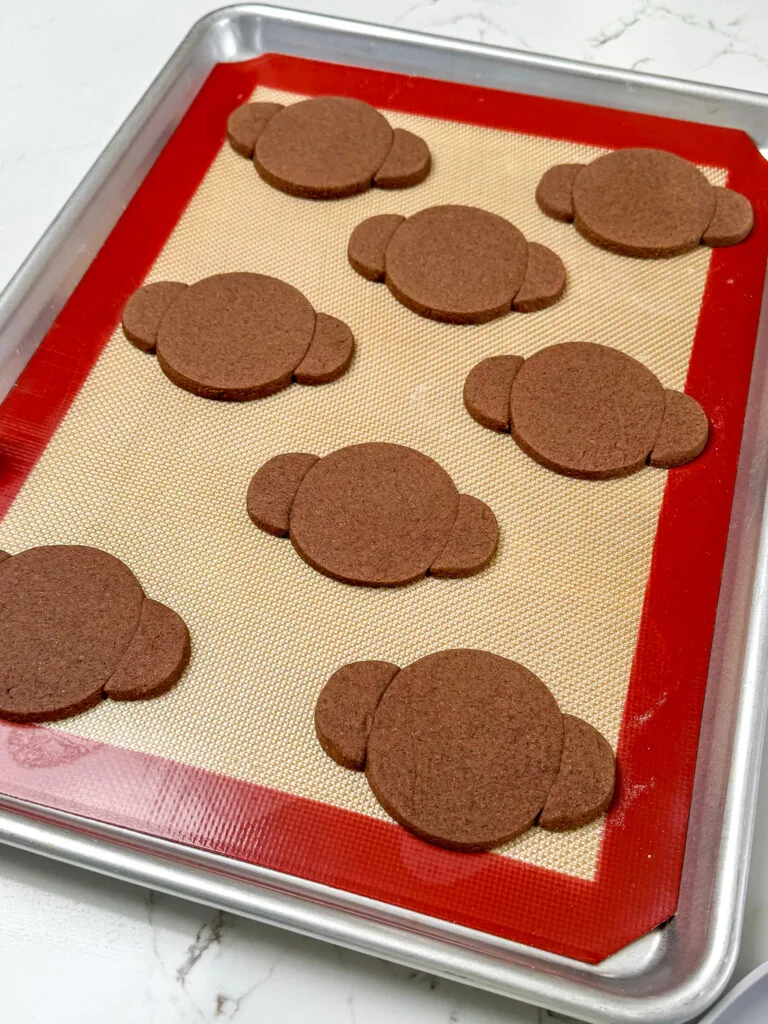 image of baked chocolate cookies that are shaped like a monkey's head