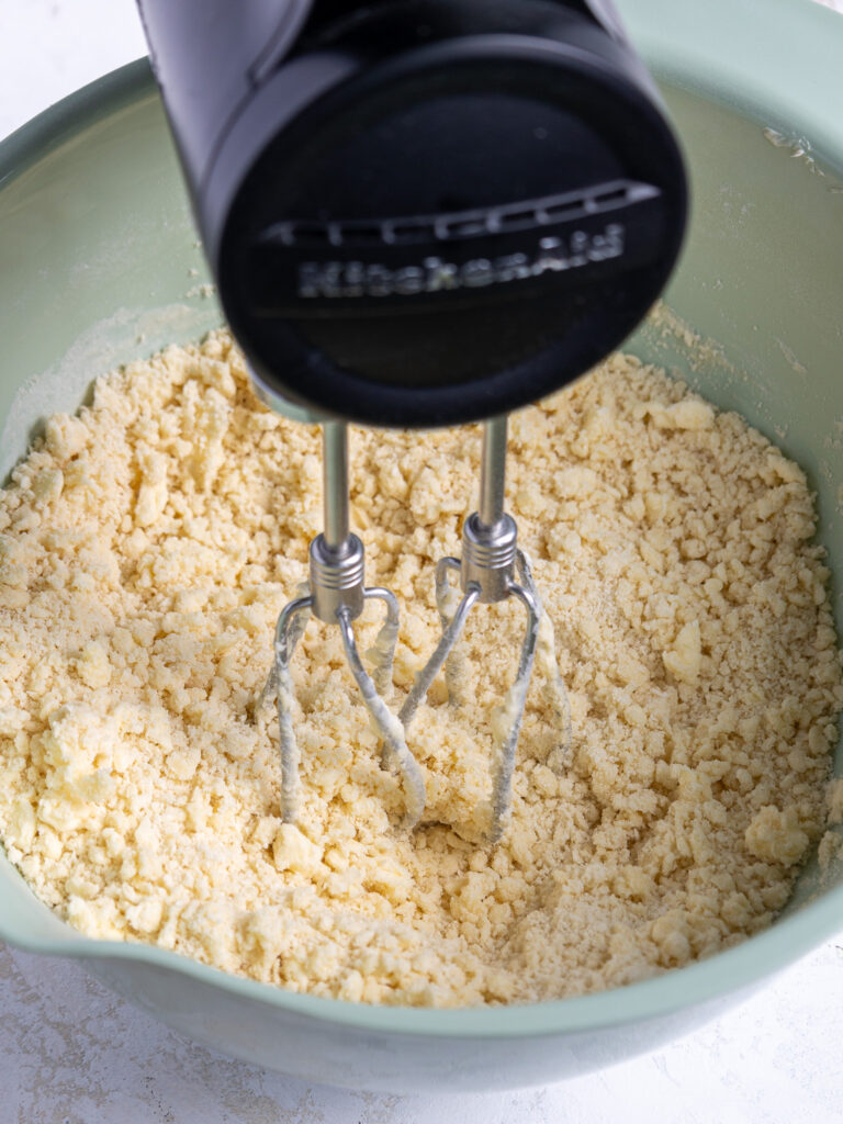 image of shortbread dough being made with an electric hand mixer
