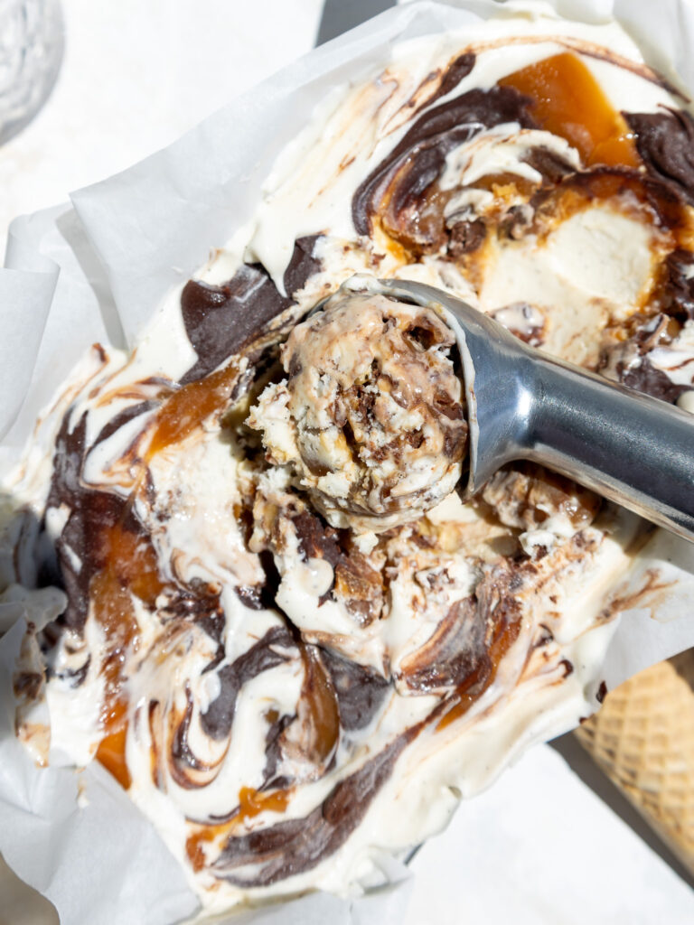 image of no churn chocolate caramel ice cream being scooped