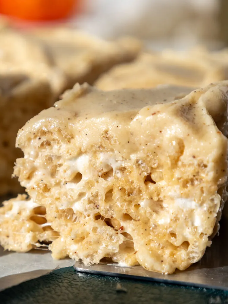 image of brown butter rice krispie treats being picked up