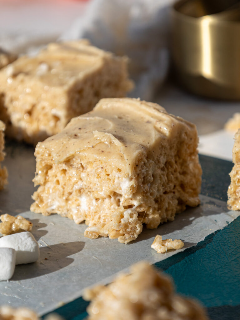 image of brown butter rice krispie treats being picked up