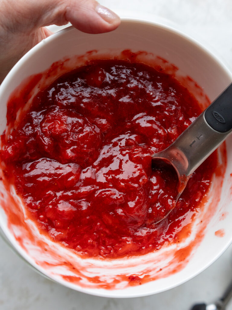 image of strawberry reduction that's been made and poured into a ceramic bowl to cool