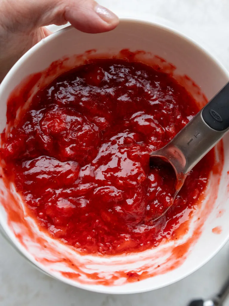 image of strawberry reduction that's been made and poured into a ceramic bowl to cool