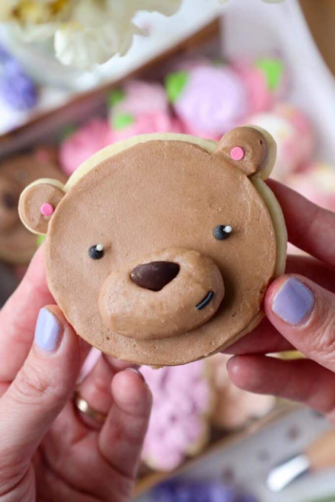 image of an adorable buttercream teddy bear cookie