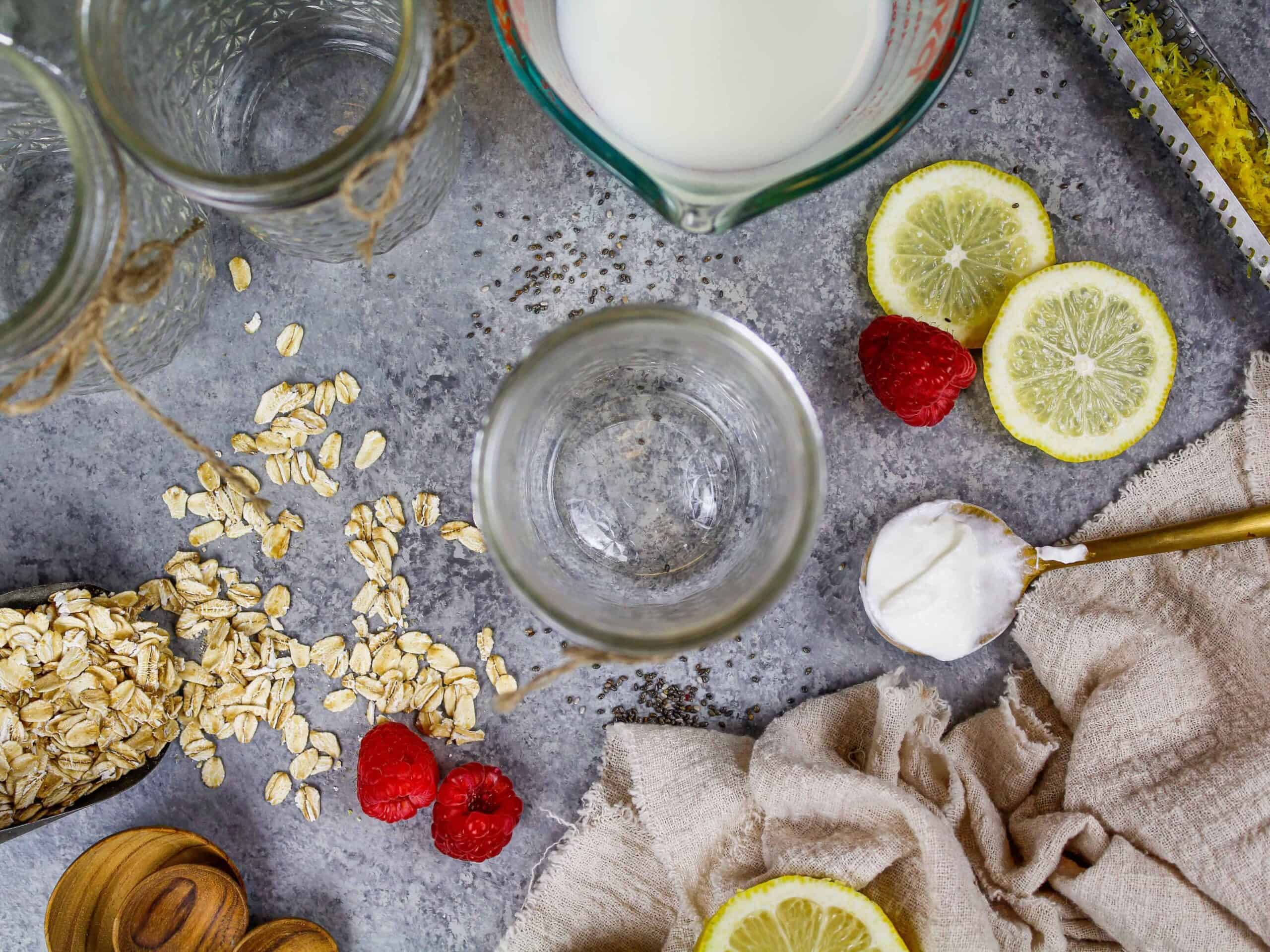 image of ingredients laid out to make a batch of raspberry overnight oats ahead of time