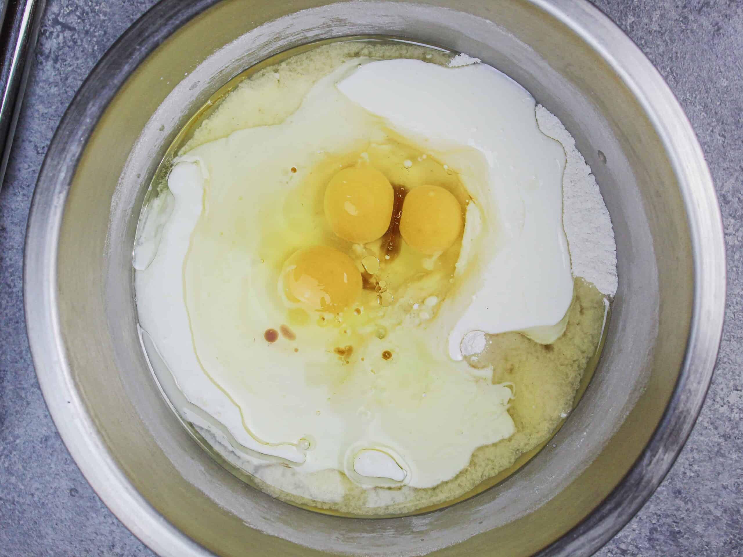 image of simple ingredients in bowl to make an easy gluten free vanilla cake from scratch