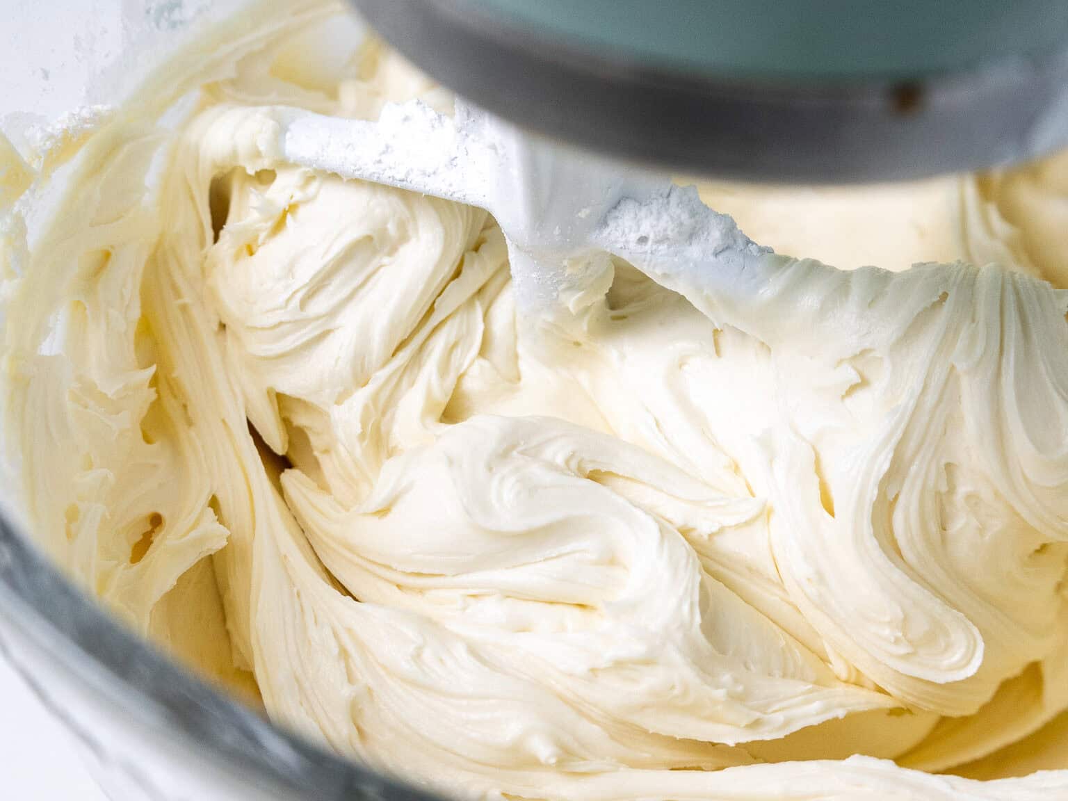 image of American buttercream being made in a kitchenaid stand mixer