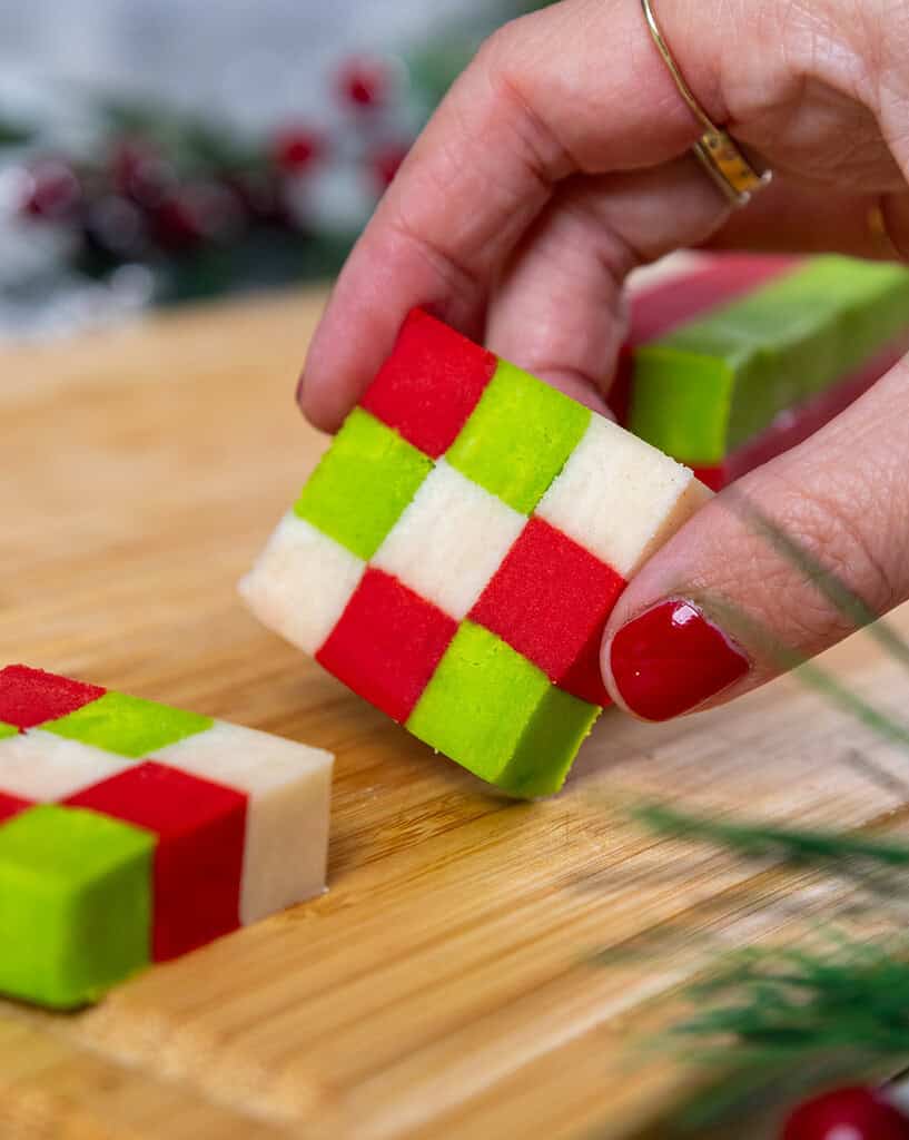image of a checkerboard cookie that's been cut into and is ready to be placed on a baking sheet to be baked