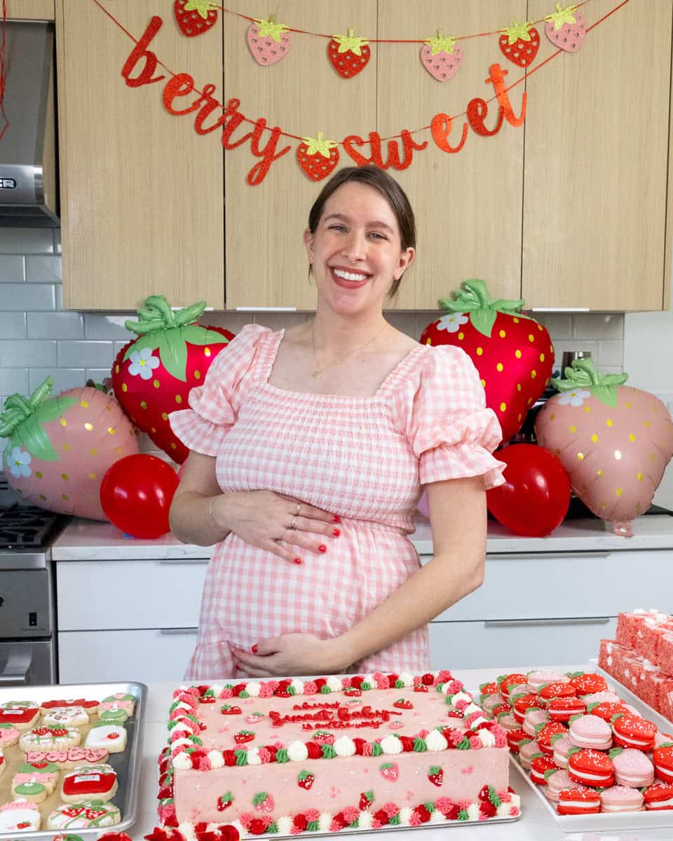 image of chelsey white at her baby sprinkle celebrating her second baby with a strawberry themed baby shower