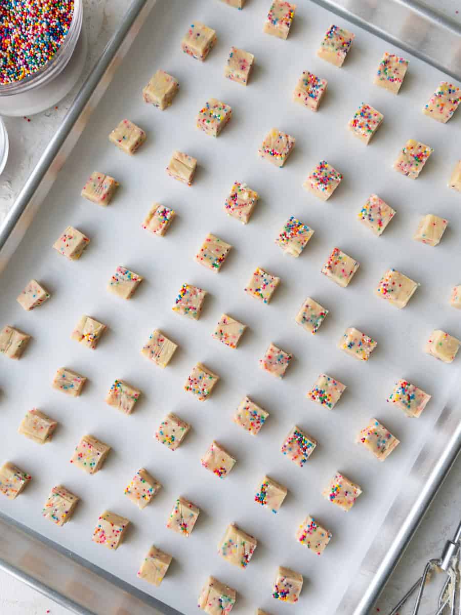image of mini funetti shortbread cookie bites on a baking sheet, ready to be baked