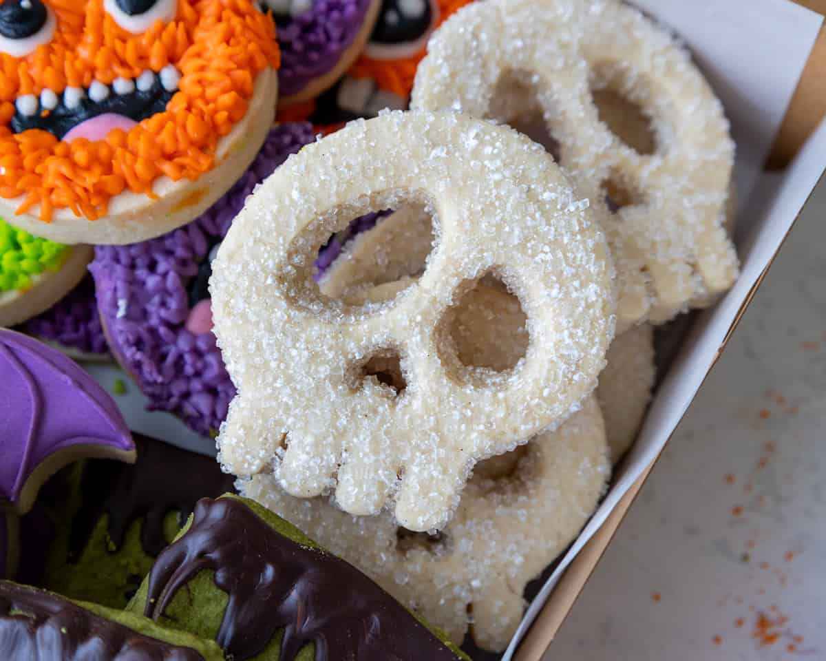 image of a skull cookie that's been decorated with white sanding sugar