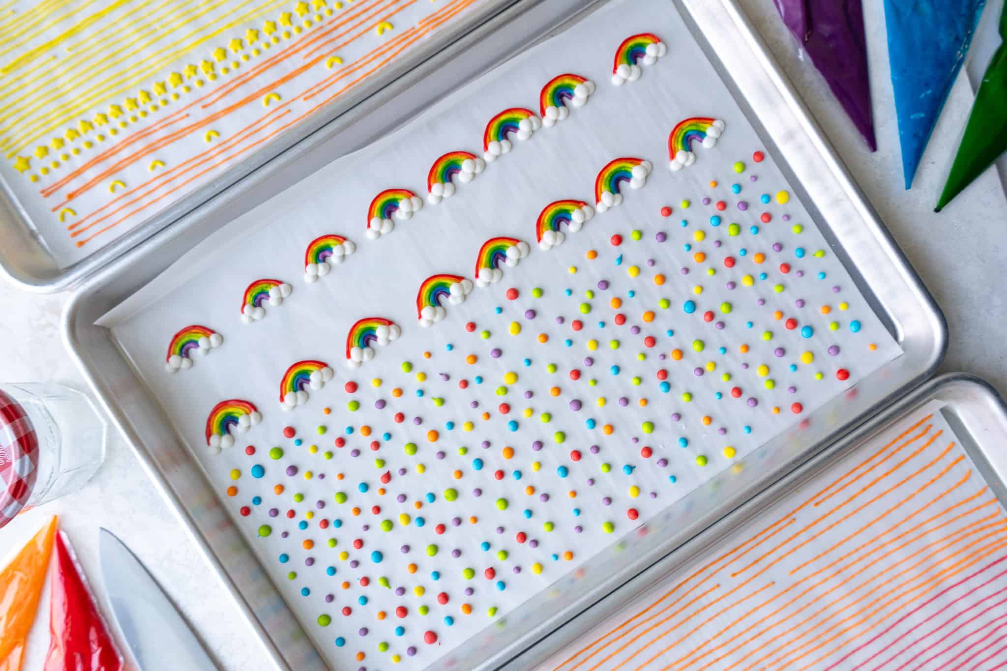 image of homemade sprinkles that have been piped on a parchment lined baking tray