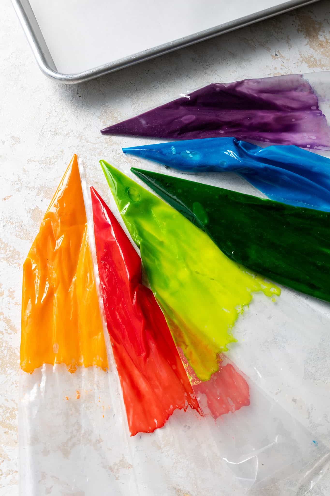 image of sprinkle batter that's been colored rainbow colors
