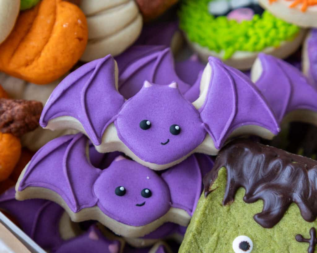 image of cute halloween bat cookies decorated with purple royal icing