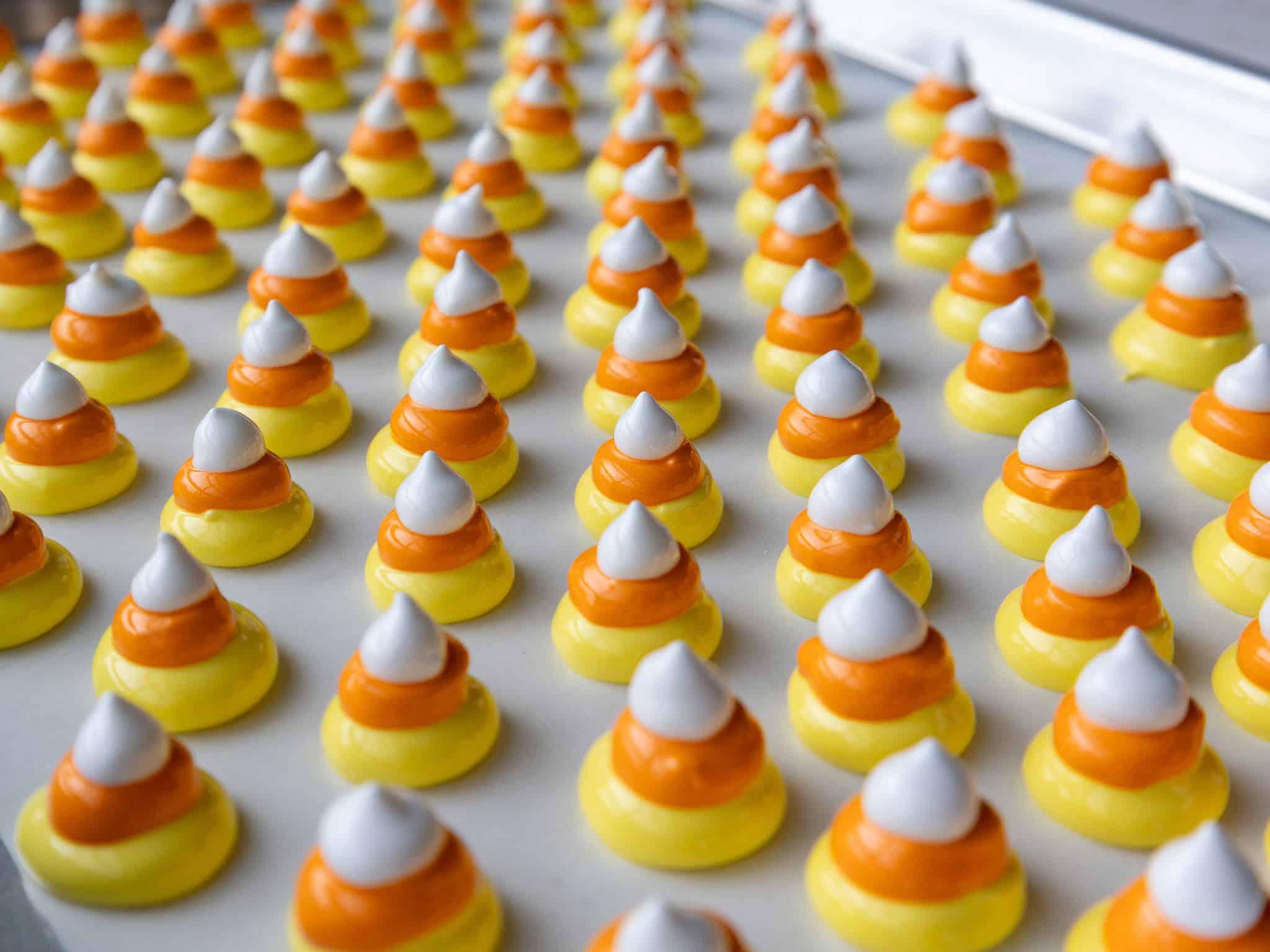 image of candy corn meringues that are about to be baked