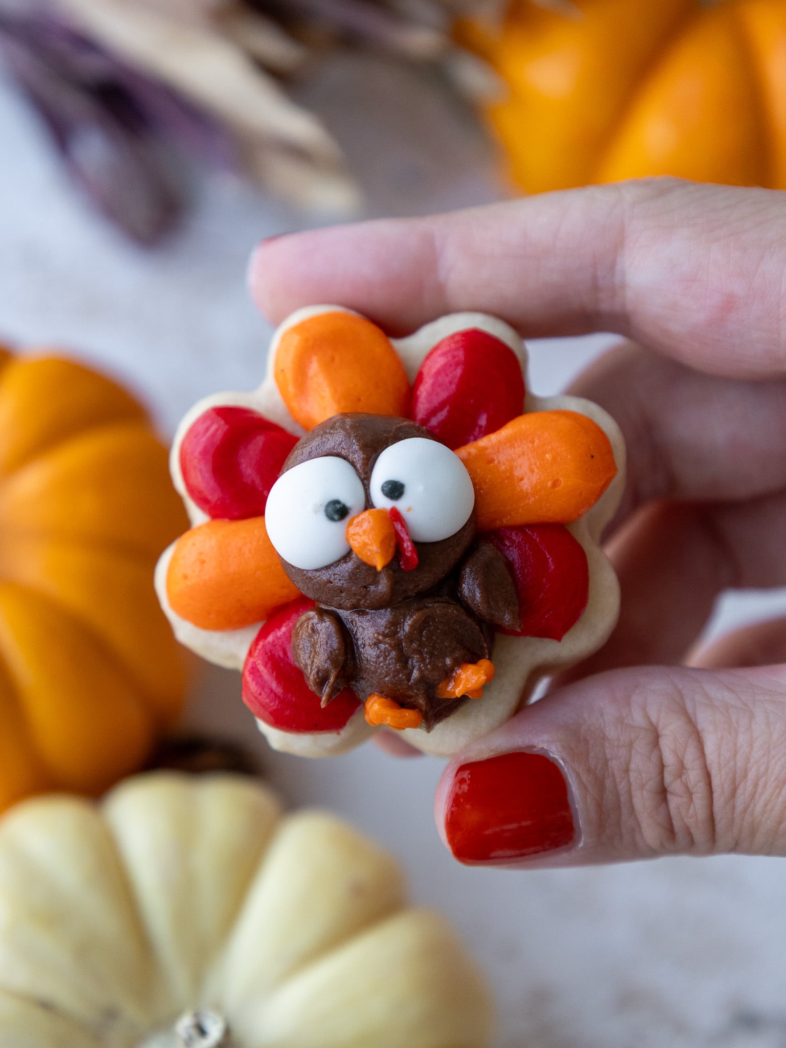 image of a cute buttercream turkey cookie